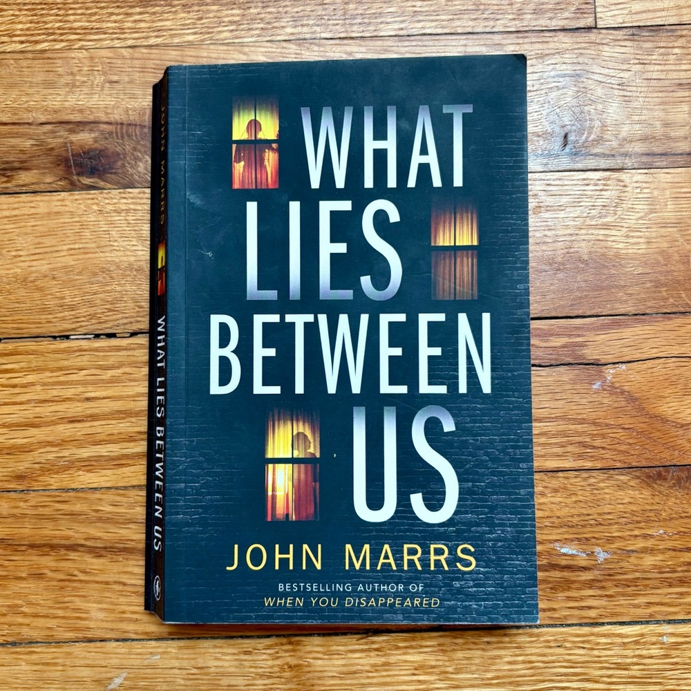 What Lies Between Us by John Maars